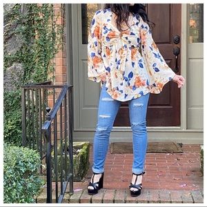 Beautiful cream flowered blouse